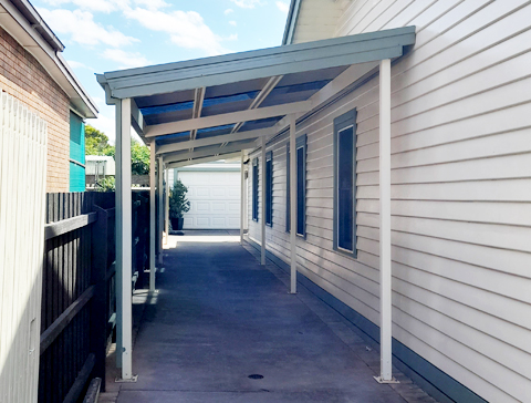 skillion long carport at the side of a house
